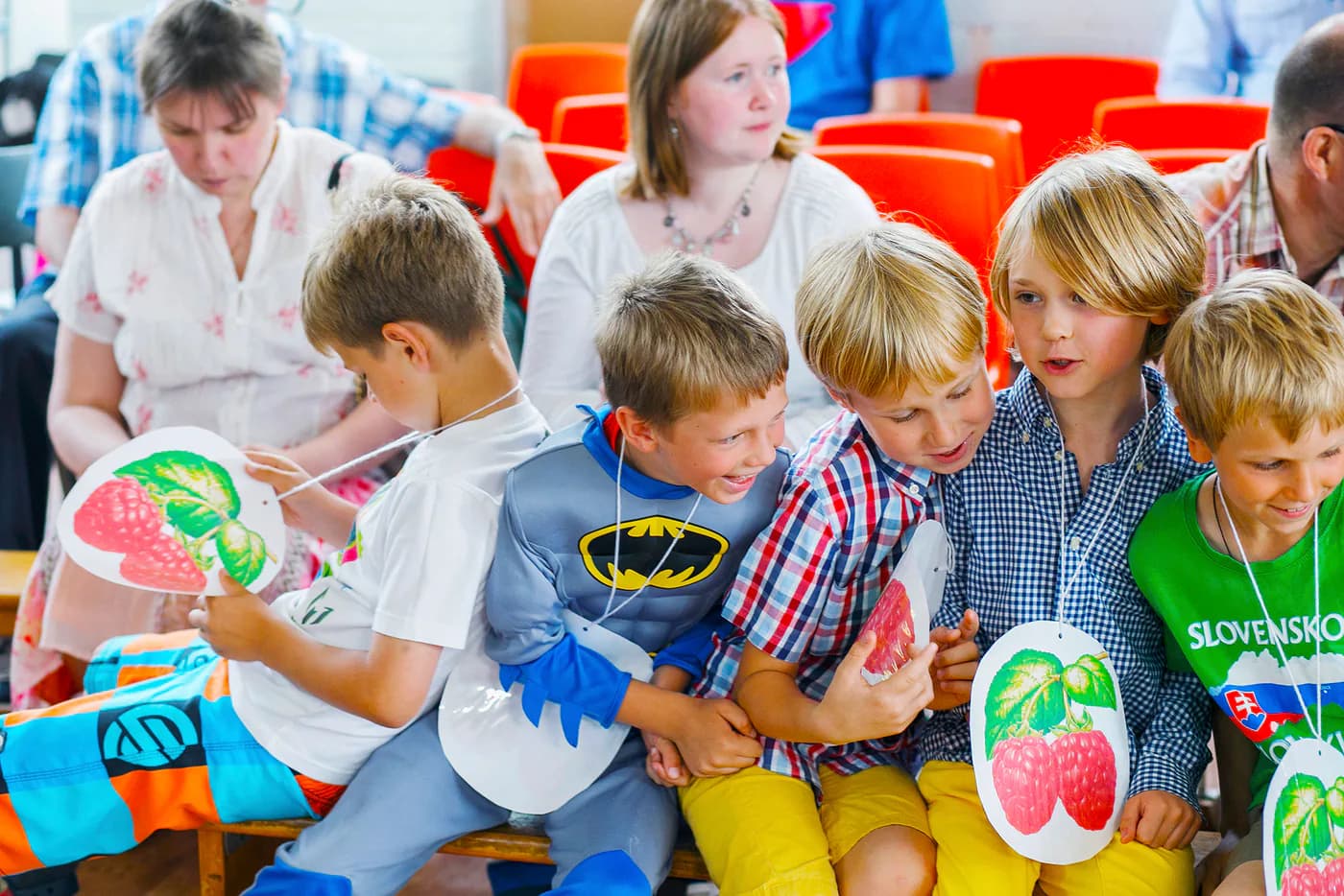 Children taking part in a group book activity.