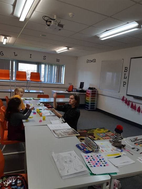 Children taking part in a classroom learning activity.