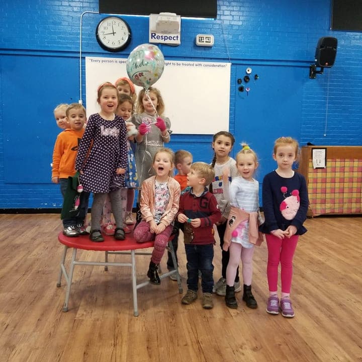 Children gathered for a High Wycombe school group photo.