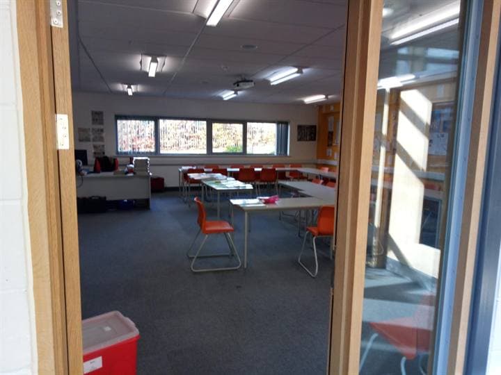 An empty room prepared for school activities.
