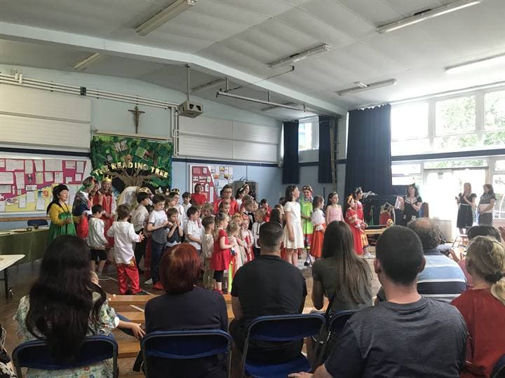 Children performing at a school community event.