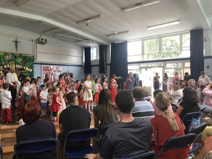 Children taking part in a school performance.