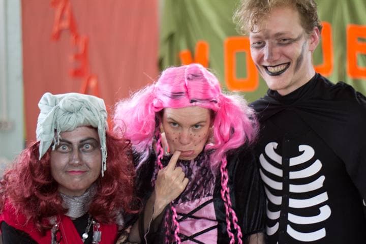 Children in costume after a school performance.