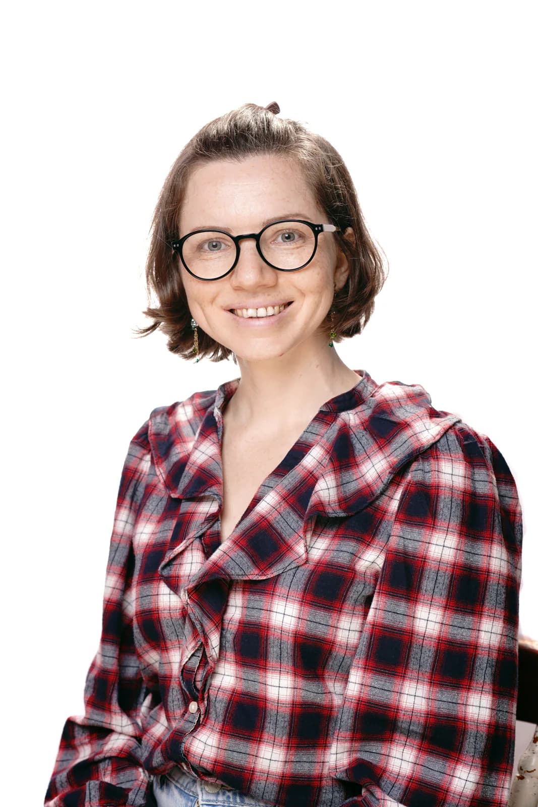 A staff portrait photographed against a plain white background.