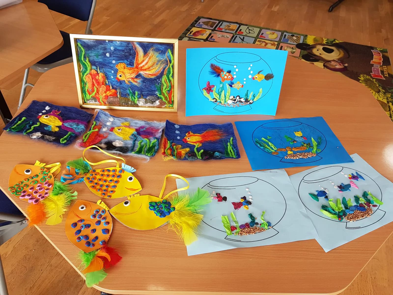 Children's creative work displayed for a Russian school activity.